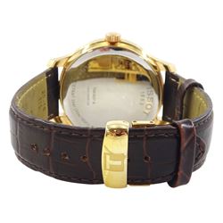 Tissot Tradition Perpetual Calendar gentleman's gold-plated and stainless steel quartz wristwatch. Ref. T063637 A, silvered dial with dagger hour markers and Arabic 12 o'clock, on original brown leather strap, with fold-over clasp, cased and boxed with additional parts
