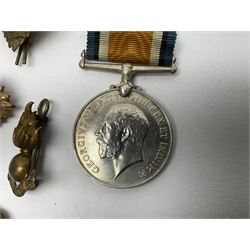 WW2 German Luftwaffe Mess cutlery comprising table spoon and fork, each with H.M.Z.38 mark; WW1 British War Medal awarded to L-13858 Gnr. J. McCabe R.A.; and small quantity of military badges, rank pips etc