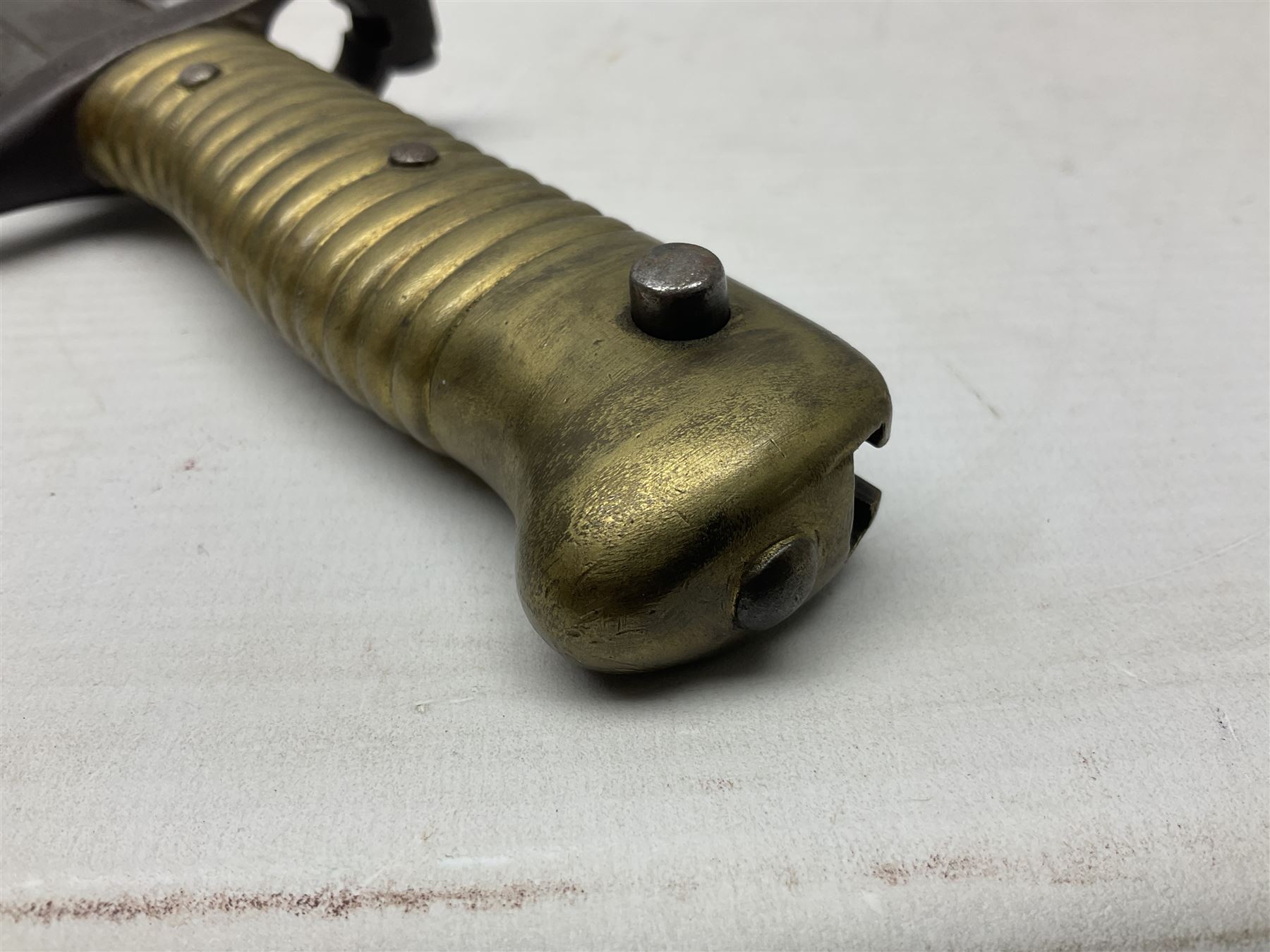 French Model 1866 Chassepot bayonet with 57cm curving fullered steel blade dated 1873 No.L63963; in steel scabbard with conforming number L71.5cm overall; and French St. Etienne Gras bayonet dated 1878 No.K10674 in steel scabbard numbered 79437 (2)