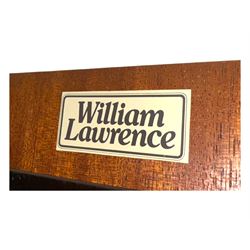 William Lawrence - mid-20th century teak double wardrobe, upper storage section over twin doors featuring recessed handles and contrasting horizontal panel, enclosing hanging rail compartment, towel rail, mirror, shelves and drawer, on plinth base with concealed castors