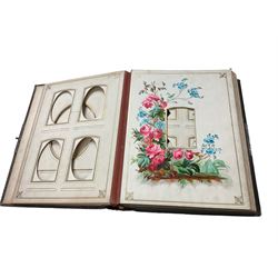 19th Century Victorian leather bound embossed photograph album having hand painted pages of birds and flowers, together with a collection of photographs