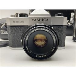 Yashica-A camera body, serial no. A4080073, with 'Yashikor 1:3.5 f=80mm' lens, serial no. 209272 and 'Yashikor 1:3.5f=80mm' lens, serial no 22942, together with Yashica TL-Electro camera body, serial no. 5054162 with 'Yashinon-DS 50mm 1:1.9  40056038