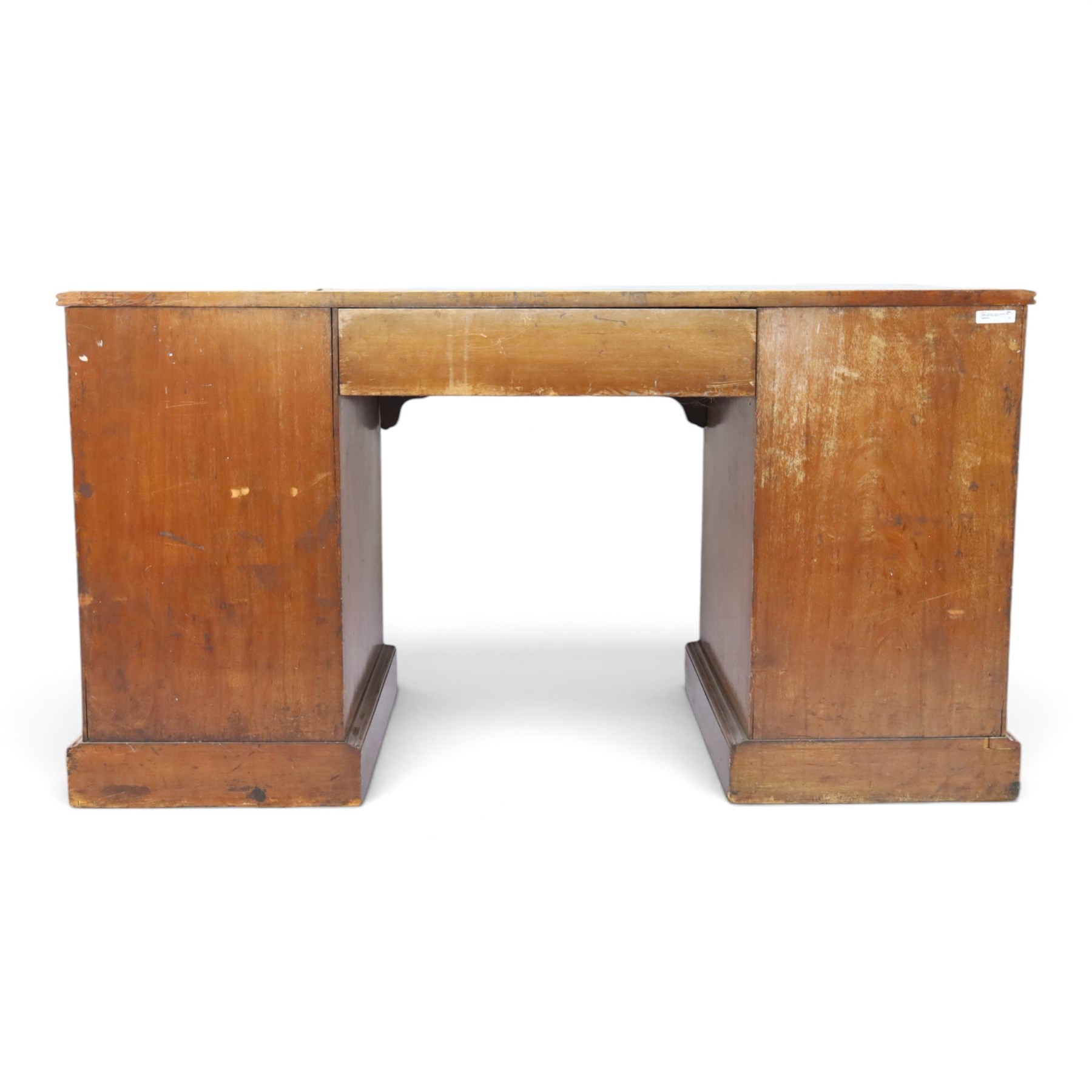 Victorian mahogany inverse breakfront twin pedestal desk, inset leather top over central drawer, flanked by pedestals with four graduating drawers, raised on a plinth base