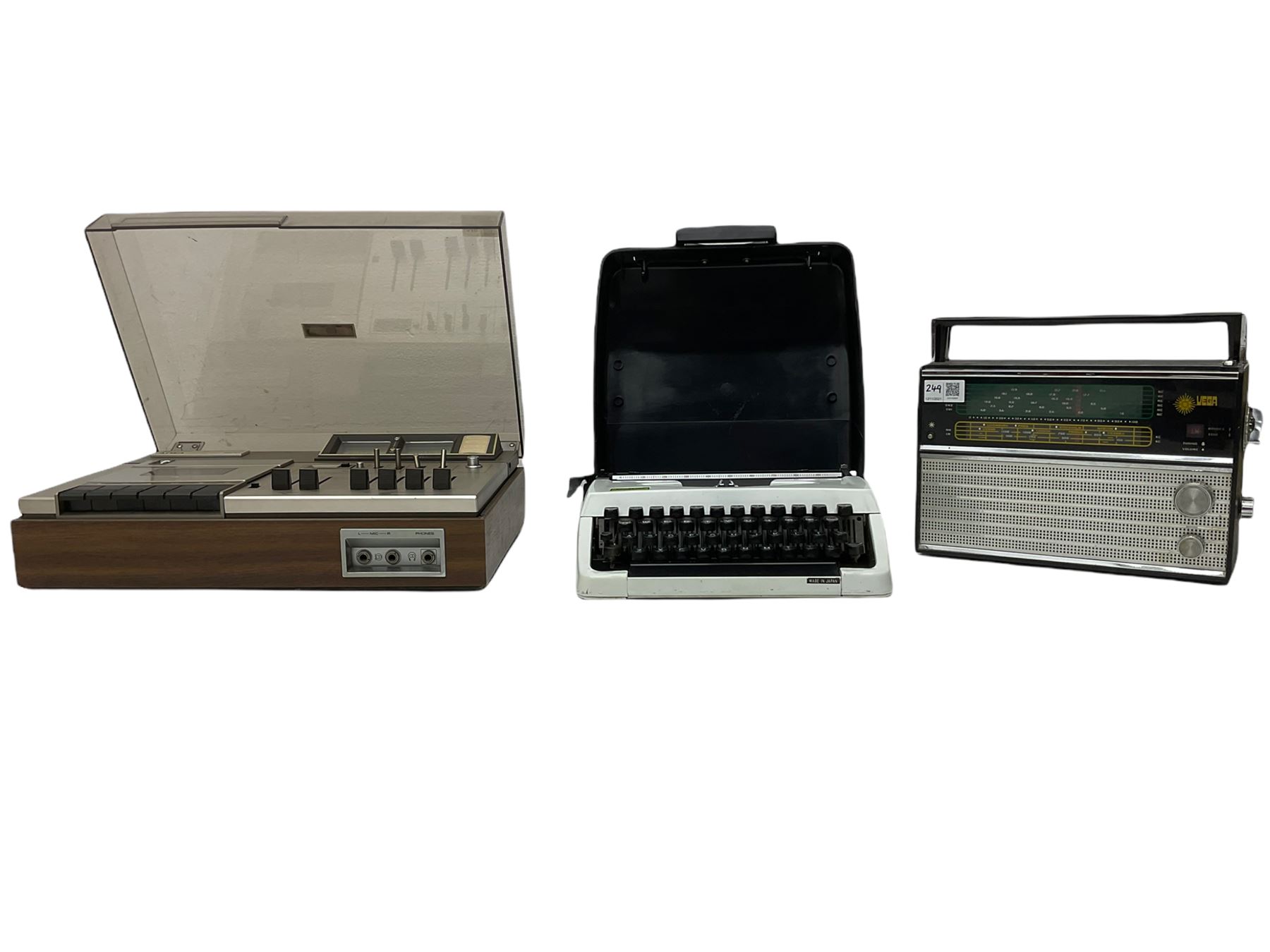 AIWA stereo cassette deck 1800, UEGA VEF 206 radio and a brother 100 type writer - all untested 