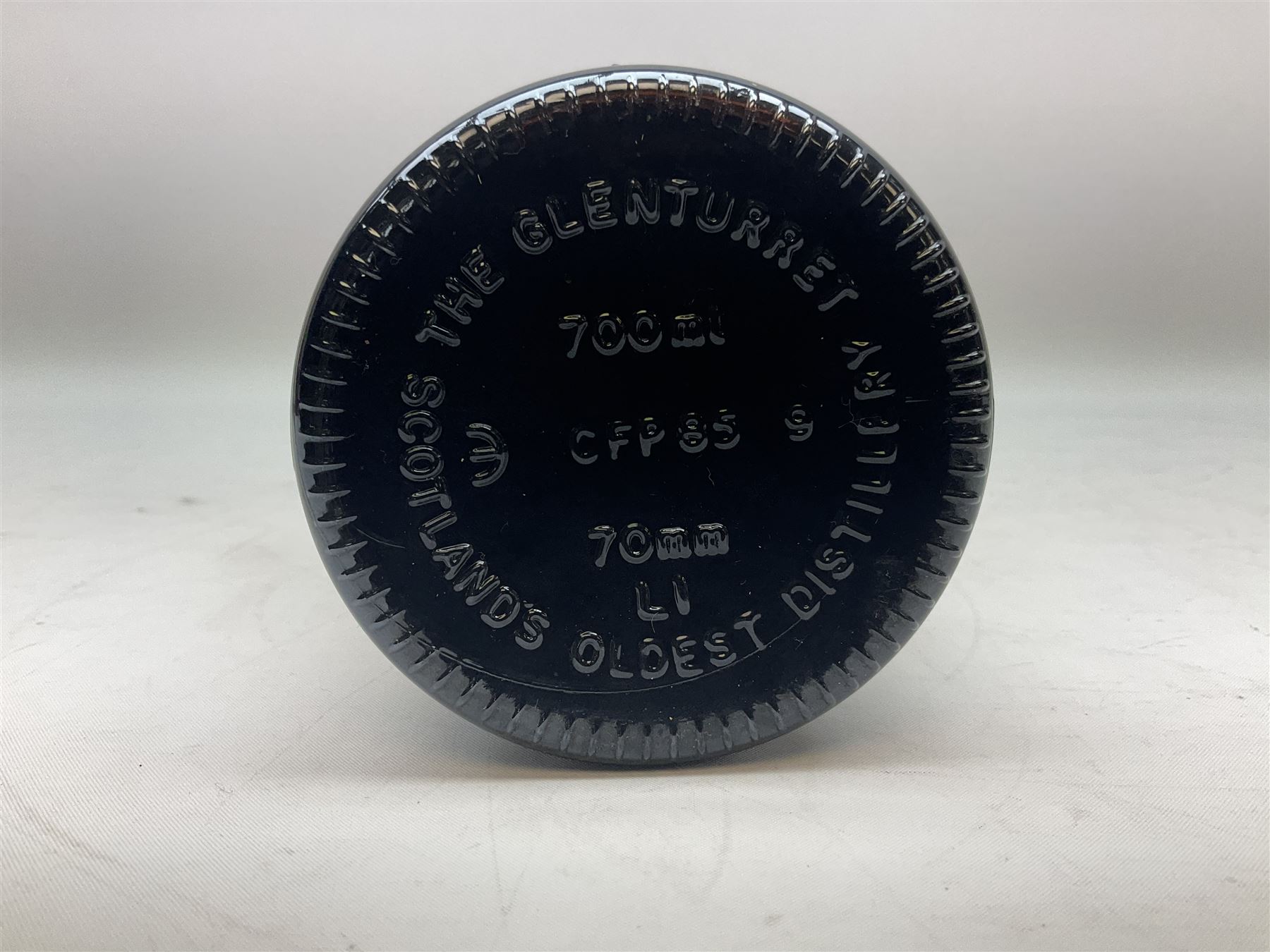 The Glenturret malt liqueur, 70cl, 35%vol and a Bell's Scotch Whisky decanter commemorating The marriage of Prince Andrew with Miss Sarah Ferguson 23rd July 1986, 75cl (2)