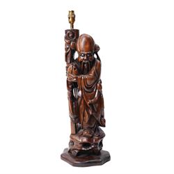 Chinese carved hardwood figure of Shou Lao formed as a table lamp H56cm excluding fitting and a Japanese brass two handled jardiniere decorated with raised panels of birds, flowers etc D27cm (2)