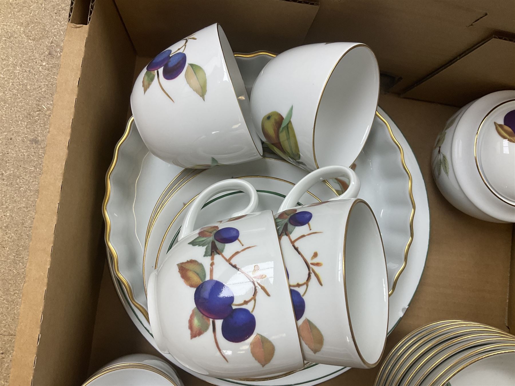 Royal Worcester Evesham and Evesham Vale tea and dinner wares, to include, three large covered tureens, coffee pot, eight tea cups and saucers, milk jug, two covered sucriers, boxed serving spoons etc, approx .130