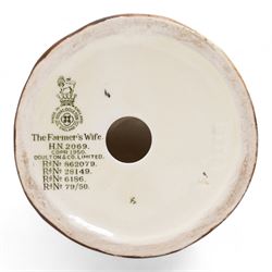 Two Royal Doulton figures 'The Farmers Wife' HN2069 and 'Lambing Time' HN1890 (2)