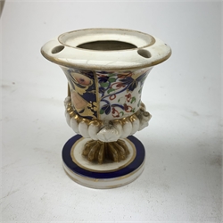 Three Bloor Derby Imari pattern twin handle urms, two examples with covers, each with mark beneath, H12cm, (all a/f), together with a pair of late 19th century Royal Crown Derby Imari pattern urns and covers, each with mark beneath, H13cm, (one significantly a/f). 