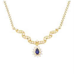 14ct gold sapphire and diamond necklace, the central diamond set ribbon design panel, susp...