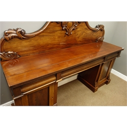  Victorian mahogany sideboard, shaped raised back with scrolled and floral mounts, three drawers and two cupboards, plinth base, W214cm, H156cm, D56cm  