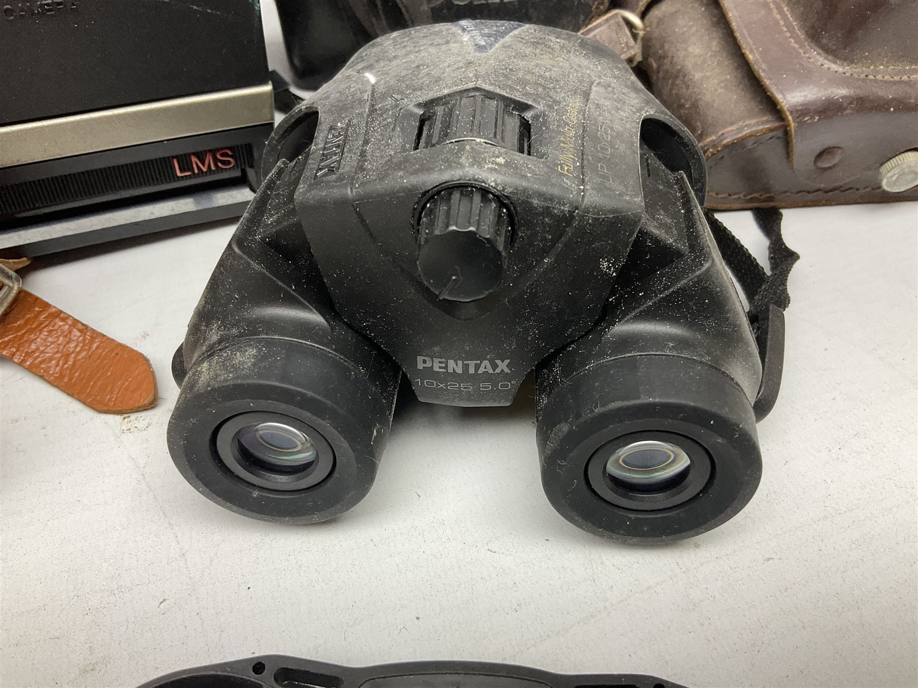 Brass telescope, together with Zenith 7 x 50 field binoculars, two polaroid cameras and other cameras and equipment 