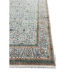 Central Persian Yazd ivory ground carpet, the field decorated with repeating Herati motifs, scroll design border with stylised flower heads 