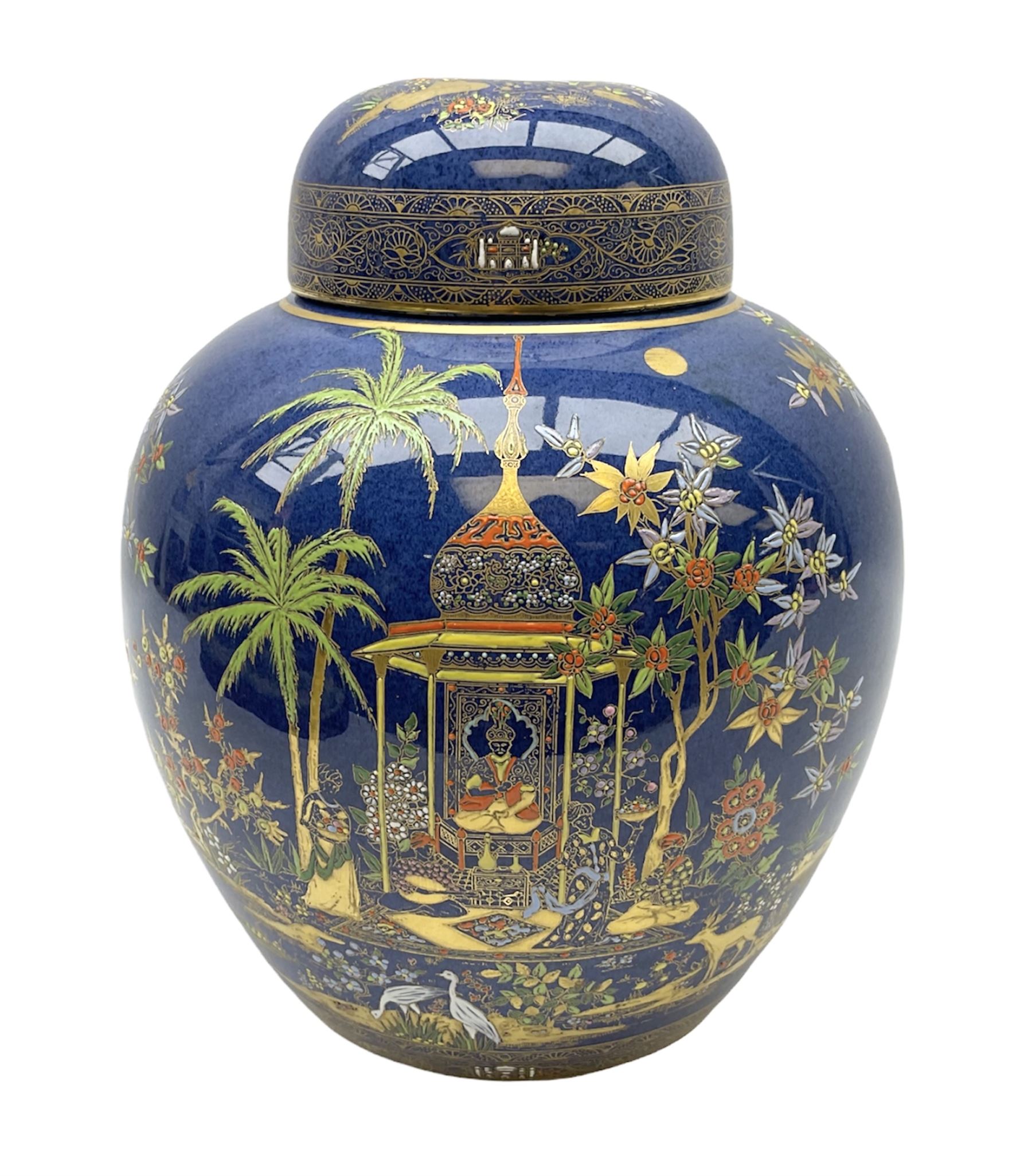 Carlton Ware Persian pattern ginger jar and cover decorated with an enamel and gilt Chinoiserie landscape with figures beside a pagoda upon a blue ground, with printed mark beneath, H27cm
