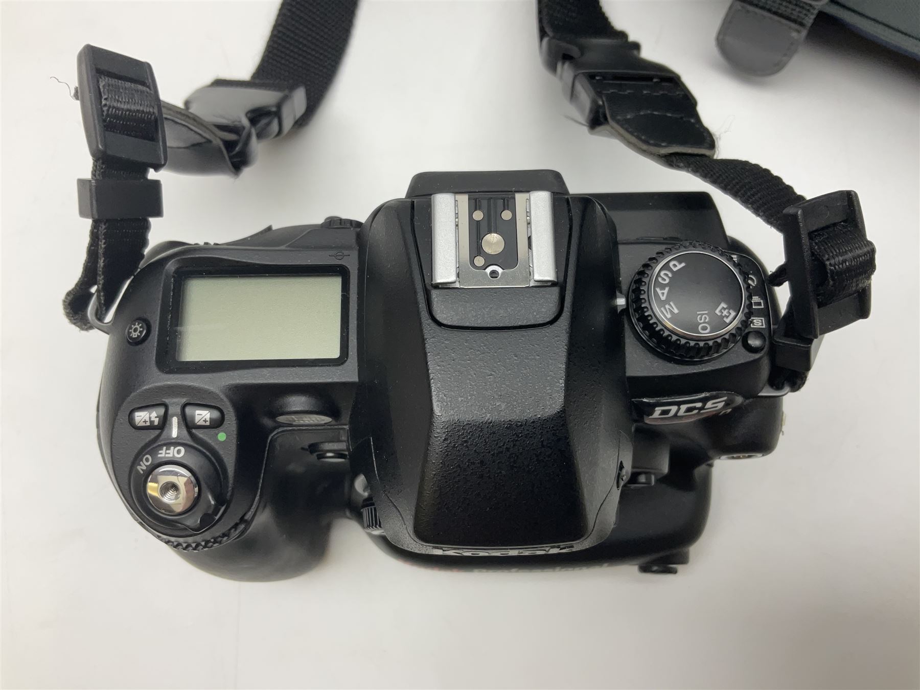 Kodak DCS pro, with Nikon F80 mount, serial no. PSLRN24607, with three batteries, charged, instruction manual and a carry case