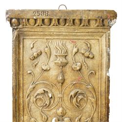 D Brucciani, London - After the antique -  A relief moulded plaster panel No2538 with stylised trailing leaves, flower heads and a mask 62cm x 22cm