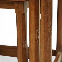 Mouseman - nest of three oak occasional tables, rectangular adzed top, on octagonal supports united by plain stretchers, each carved with mouse signature, by the workshop of Robert Thompson, Kilburn
Largest: Height: 48cm  Length/Width: 61cm  Depth/Diameter: 38cm