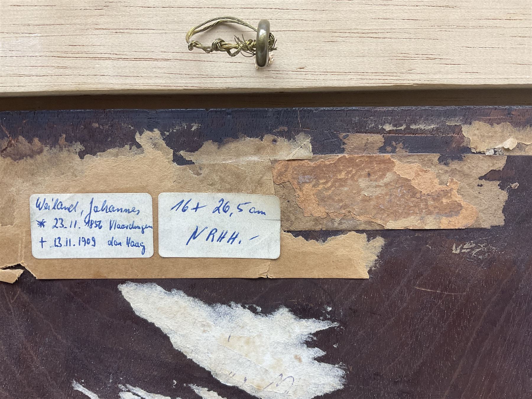 Johannes Weiland (Dutch 1856-1909): Girl Tending a Fire, oil on panel signed 14.5cm x 25cm 