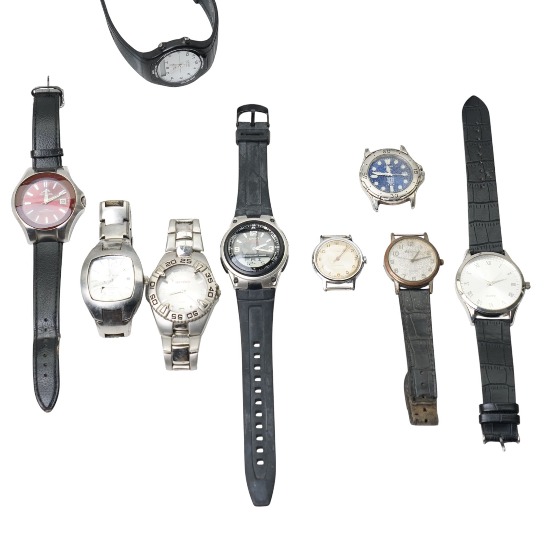 Collection of wristwatches including Casio and MG and an early 20th century gilt brass bedside timepiece, cased