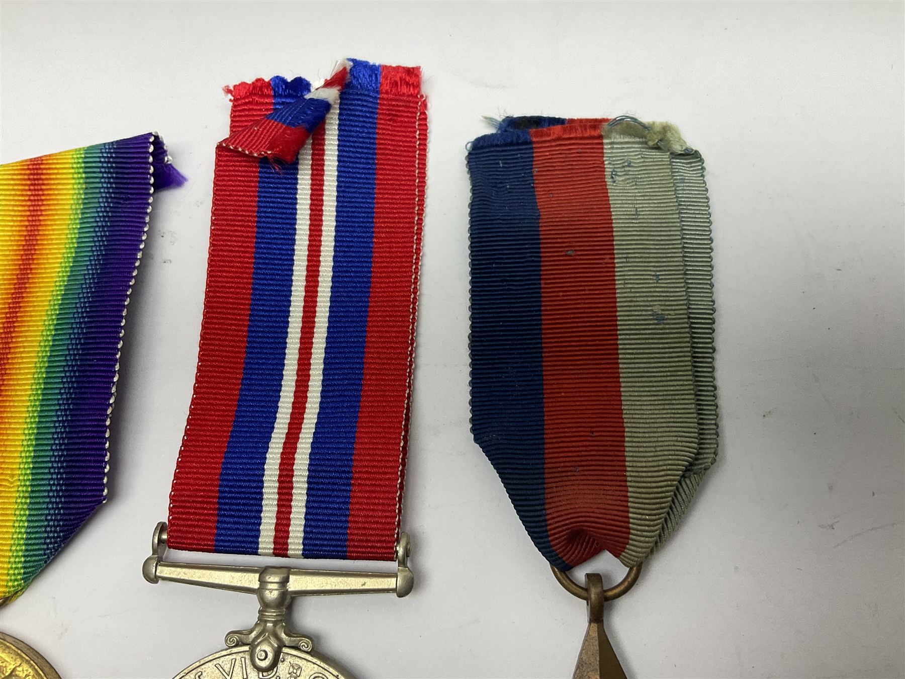 WW1 British War Medal awarded to 28885 Pte. A. Hey R. War. R.; WWI Victory Medal awarded to 7633 Pte. E. Edwards L'Pool R.; two WWII medals; Royal Navy Temperance Society Medal; Services Rendered badge No.B55177; and Home Guard lapel badge