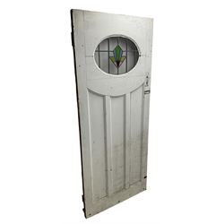 1930s external door with stained leaded glass panel (86cm x 203cm), six small stained glass windows in wooden frames (W52cm); and various loose stained leaded glass panels
