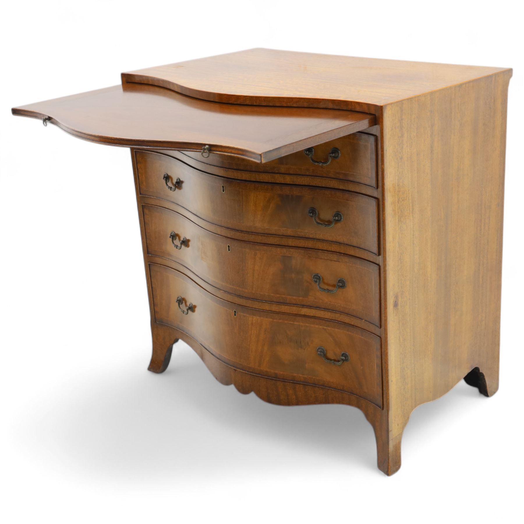 Early 20th-century Georgian design mahogany serpentine chest of drawers, rectangular-shaped top over a brush slide, and four long graduated drawers with brass swan neck handles, serpentine-shaped apron, raised on splayed front feet 