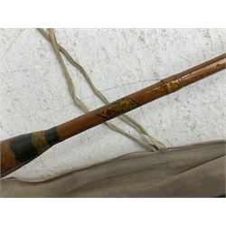 Collection of fishing rods, including some split cane rods, steel rods and examples by ER Craddock, Shakespeare and Daiwa, together with a Gamebird shooting stick, mostly in canvas slip cases