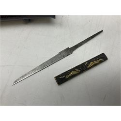 Japanese Tanto with 28.5cm steel blade and cord bound grip; in red spotted black lacquer saya containing a kogai knife with etched characters to the blade and ornate fern leaf and snake handle