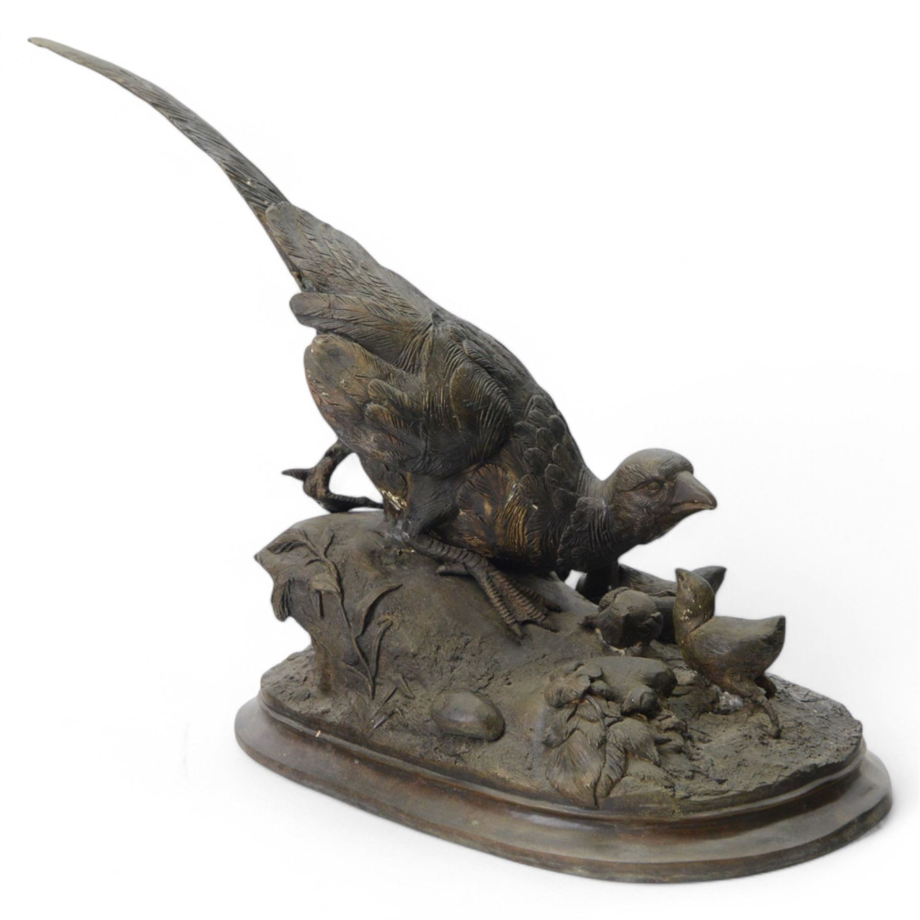 Bronzed figure group of a pheasant with six chicks upon a naturalistically modelled ground, after A. Arson, H45cm