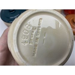 Collection of mostly Sylvac kitchen storage jar face pots, including piccalilli, chutney, tomato and bread sauce, tallest H15.5cm