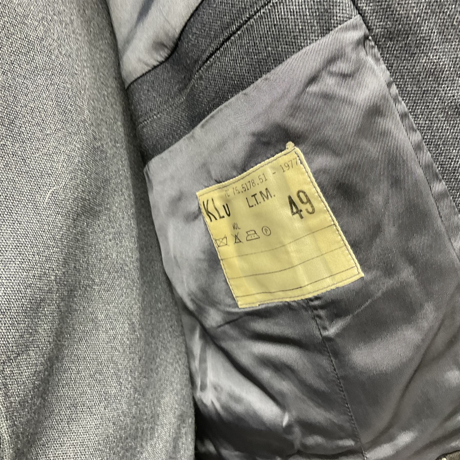 Two post-WWII British Army No.2 Dress tunics, one with Green Howards buttons; army shirt dated 1951; Royal Fleet Auxilliary jacket with trousers; three RAF/WAAF uniforms and RAF Greatcoat; and three canvas/webbing bags, two dated 1943 & 1945