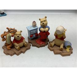 Collection of eight Disney Pooh and Friends figures, comprising Hip, hip Poohray for birthdays, Tricks and treats for someone sweet, We'll share forever whatever the weather, Thanks for being a Caring Sort of Bear, Now it's perfect just like you, Have a red-shirt red letter day, Life is sweet and I love you Mama, all with boxes