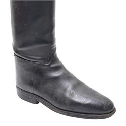 Two pairs of leather riding boots with wooden trees