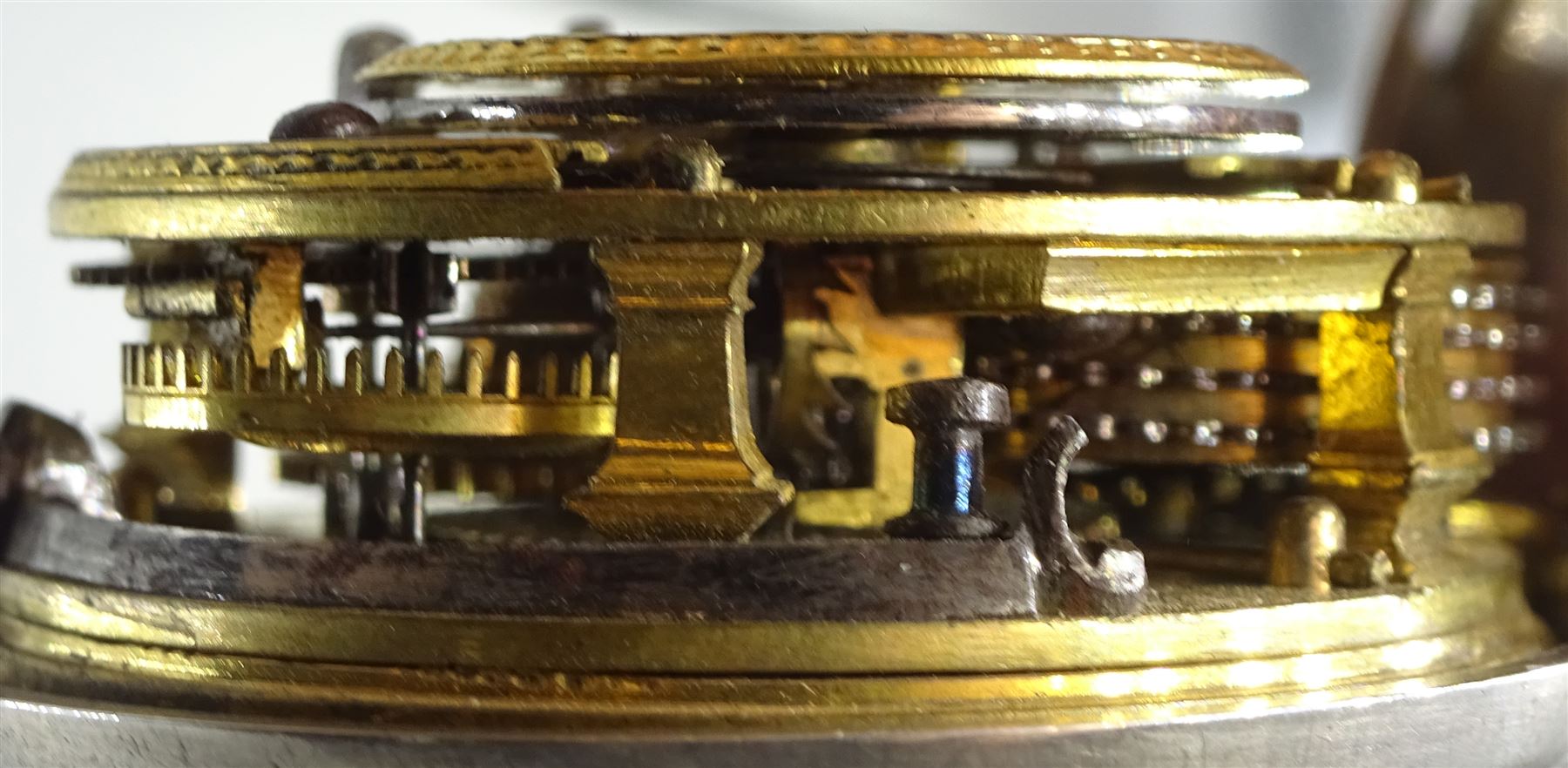 George III silver pair cased verge fusee pocket watch by John Richards, London, pierced and engraved balance cock, white enamel dial with Arabic numerals, bull's eye glass, case by Thomas Gosling, London 1778/80