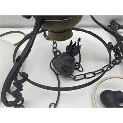 Wrought iron and brass ceiling light, with spiral turned supports, an ovoid reservoir, with a milk glass shade, together with a wall mounted hinged lamp, ceiling light H65cm