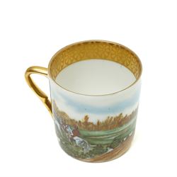 Limoges  coffee set decorated with hunting scenes within a gilt border comprising twelve cups and saucers, coffee pot, cream jug and sugar bowl