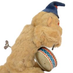 Two West German Urwald-Musik clockwork monkeys, one playing cymbals and the other a drum
