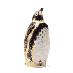 Royal Crown Derby paperweights, Galapagos Penguin limited edition 177/1000 and Madagascan Tortoise 177/1000, both from the Endangered Species series with gold stoppers and certificates