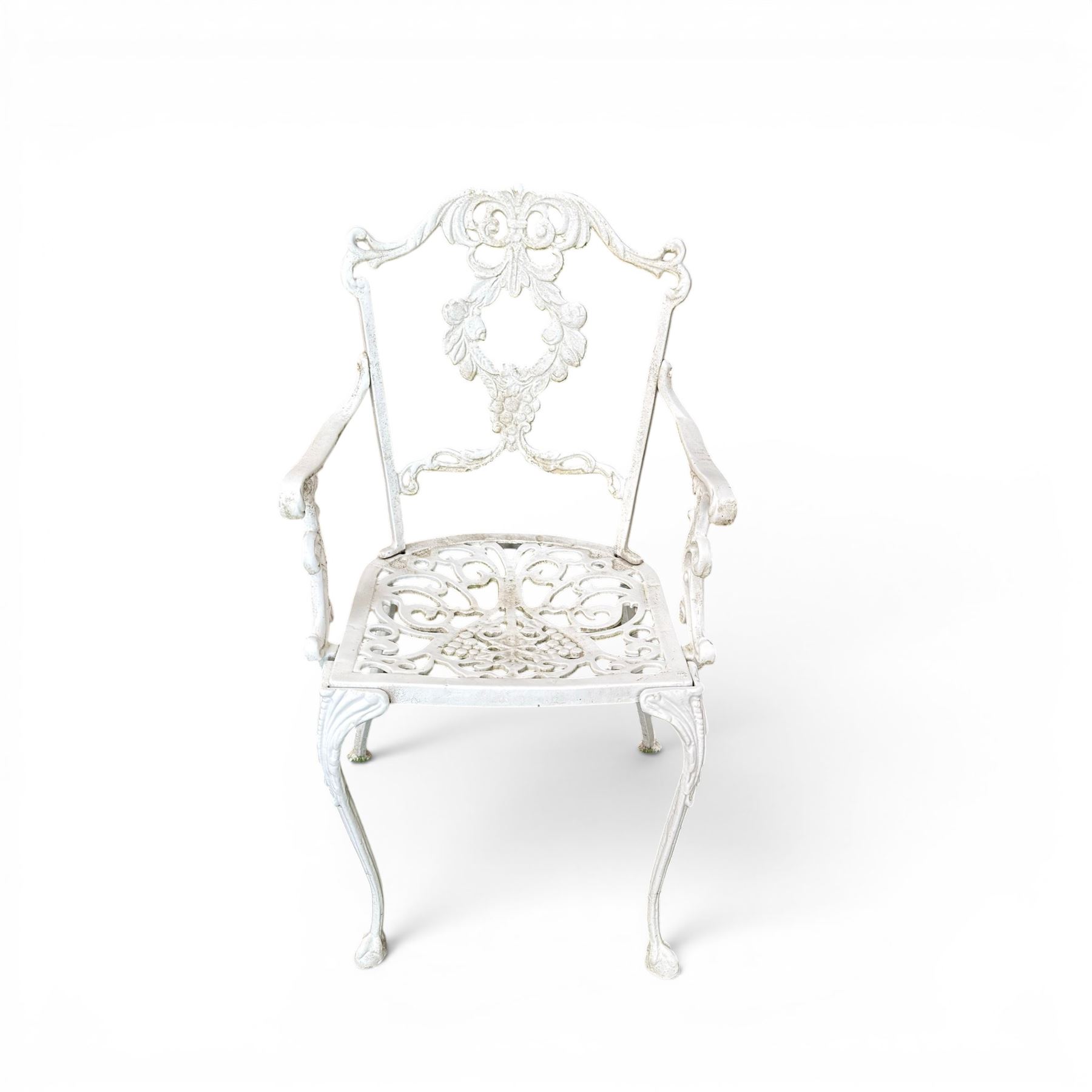 Victorian design cast aluminium circular garden table and four armchairs, ornate grape design in antique white paint