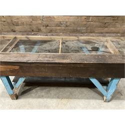 Large timber work bench with central glass section, and two pairs of vintage wooden step ladders (3)