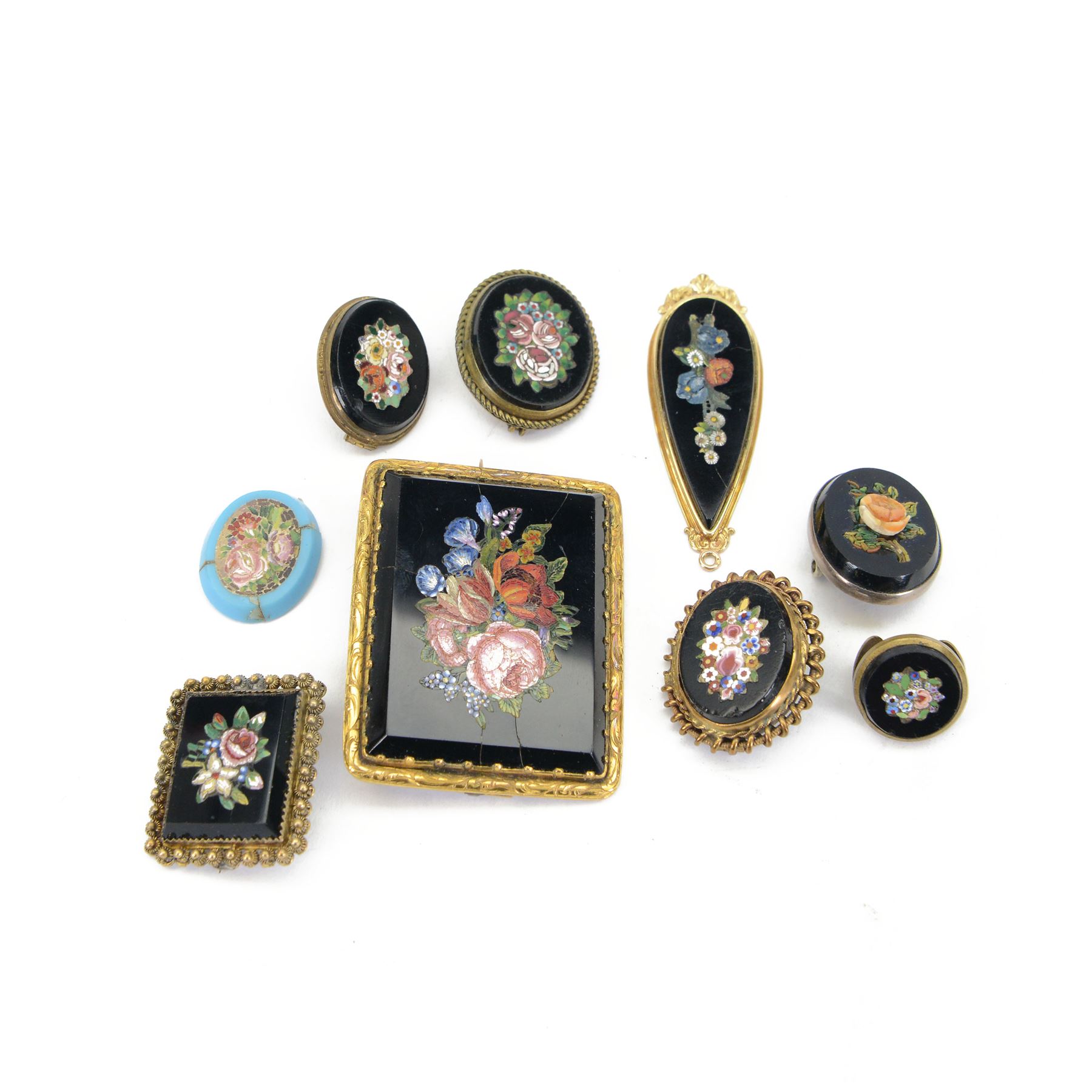 19th century micro mosaic brooch, the centre decorated with a floral bouquet, cased within a gilt metal case, together with five other brooches and pendent     