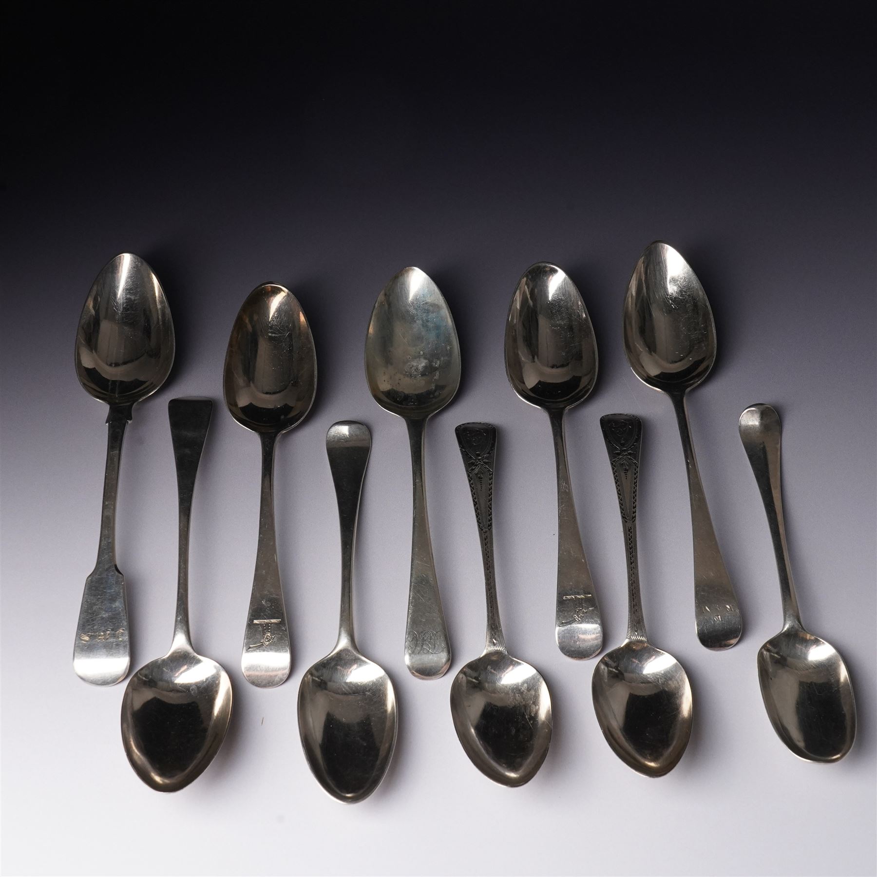 Pair of George III silver table spoons with engraved decoration London 1809 Maker Hester Bateman and eight other 19th century silver table spoons, various dates and makers (10) 