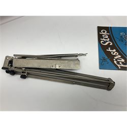 Late 19th/early 20th century Italian lute back mandolin with segmented back and spruce top; bears maker's label for Pietro Tonelli Napoli; together with a mandolin instruction booklet and a folding music stand L60.5cm