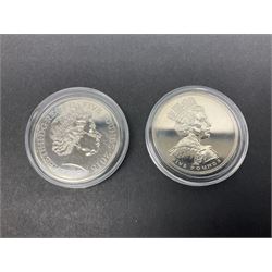 Four Queen Elizabeth II five pound coins, two commemorative two pound coins dated 2008, 2015 and various United States of America State quarter dollar coins