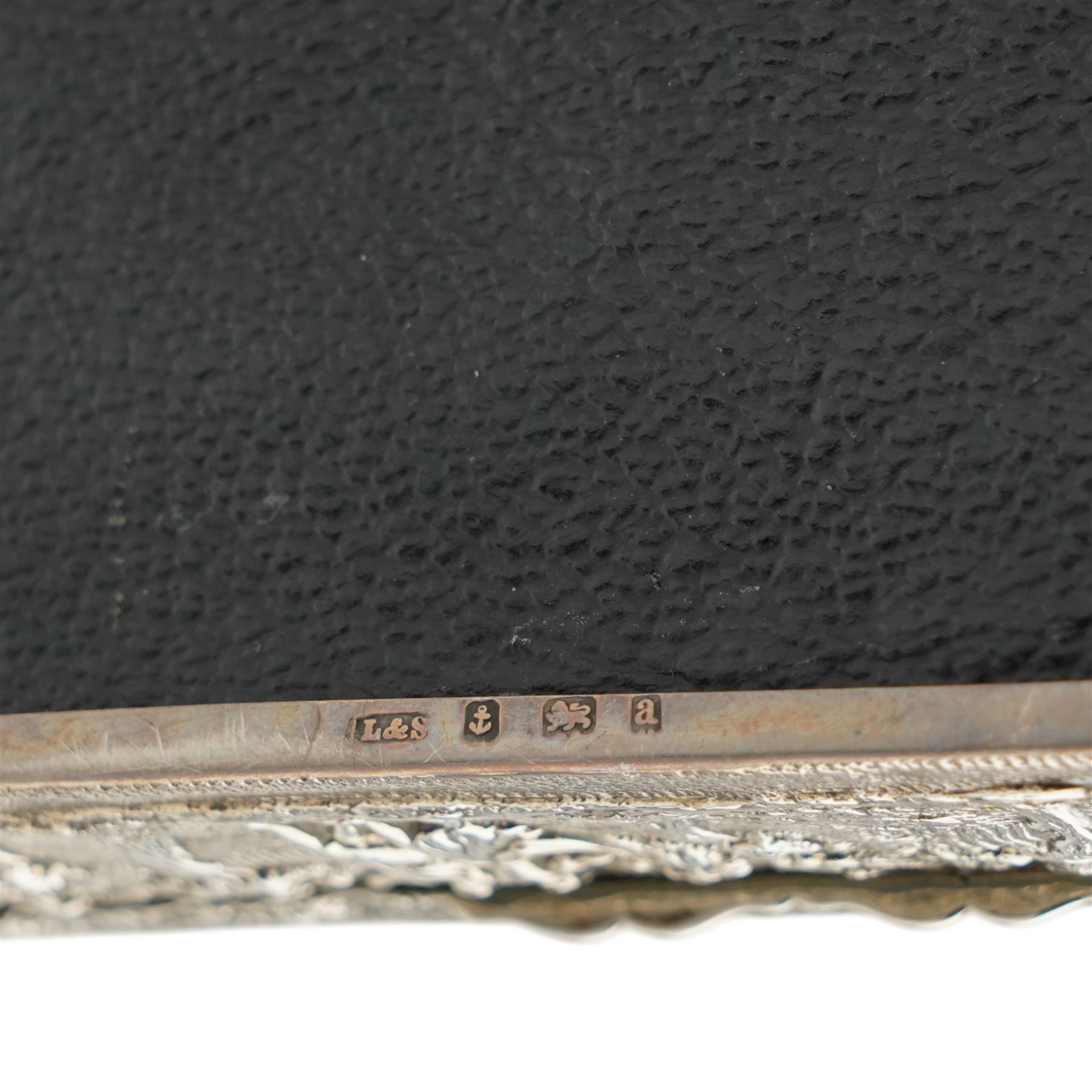 Late Victorian silver rectangular ring box embossed with classical figures, musicians, scrolls etc, and with plush lined divided interior L14.5cm Birmingham 1900 Maker Levi & Salaman