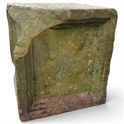 Two 18th century carved sandstone architectural elements, comprising a substantial square pedestal block with recessed panelled facias (W42cm H45cm); and a frieze fragment carved in relief with three stylised flowerheads and an undulating foliate stem (W30cm H18cm)