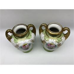 Pair of Noritake vase of baluster form with twin handles, decorated with panels of flowers and gilt on a green ground H24cm. 