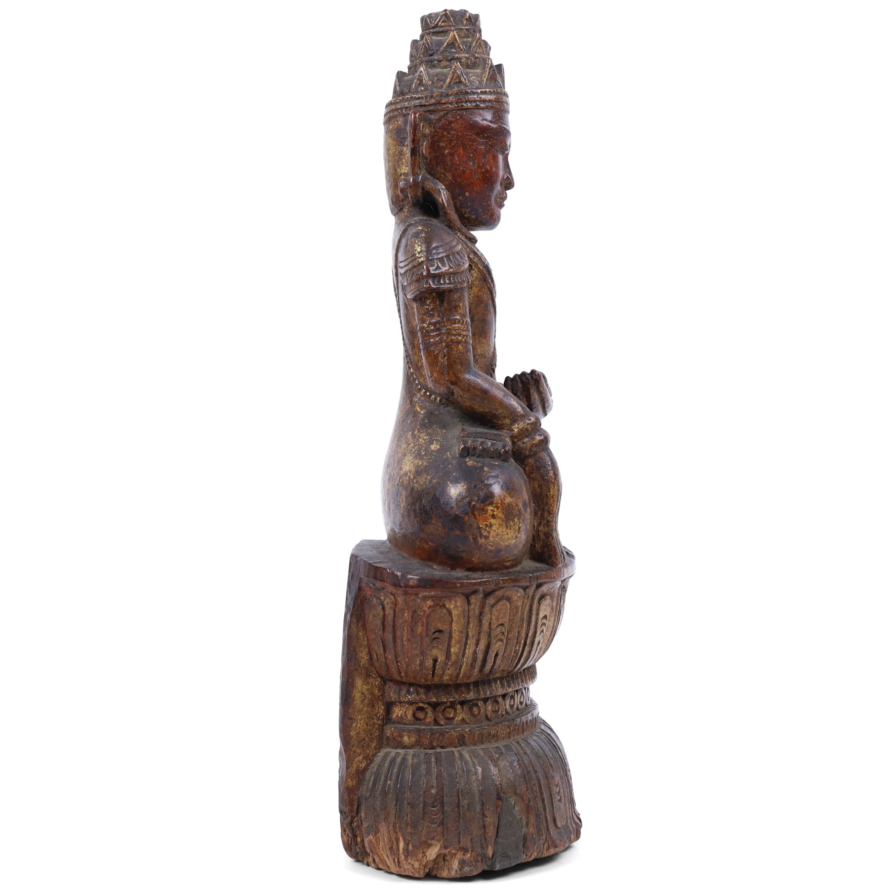 Late 18th century, carved wooden buddha, seated cross legged on a lotus base, with traces of original painted decoration, H35cm 