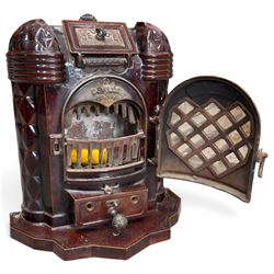 Deville & Cie of Charleville - early 20th century Art Deco cast iron and burgundy enamel 'Cristal' wood burning stove, hinged vent over lattice glazed door and ash drawer, on shaped geometric base, circa 1920