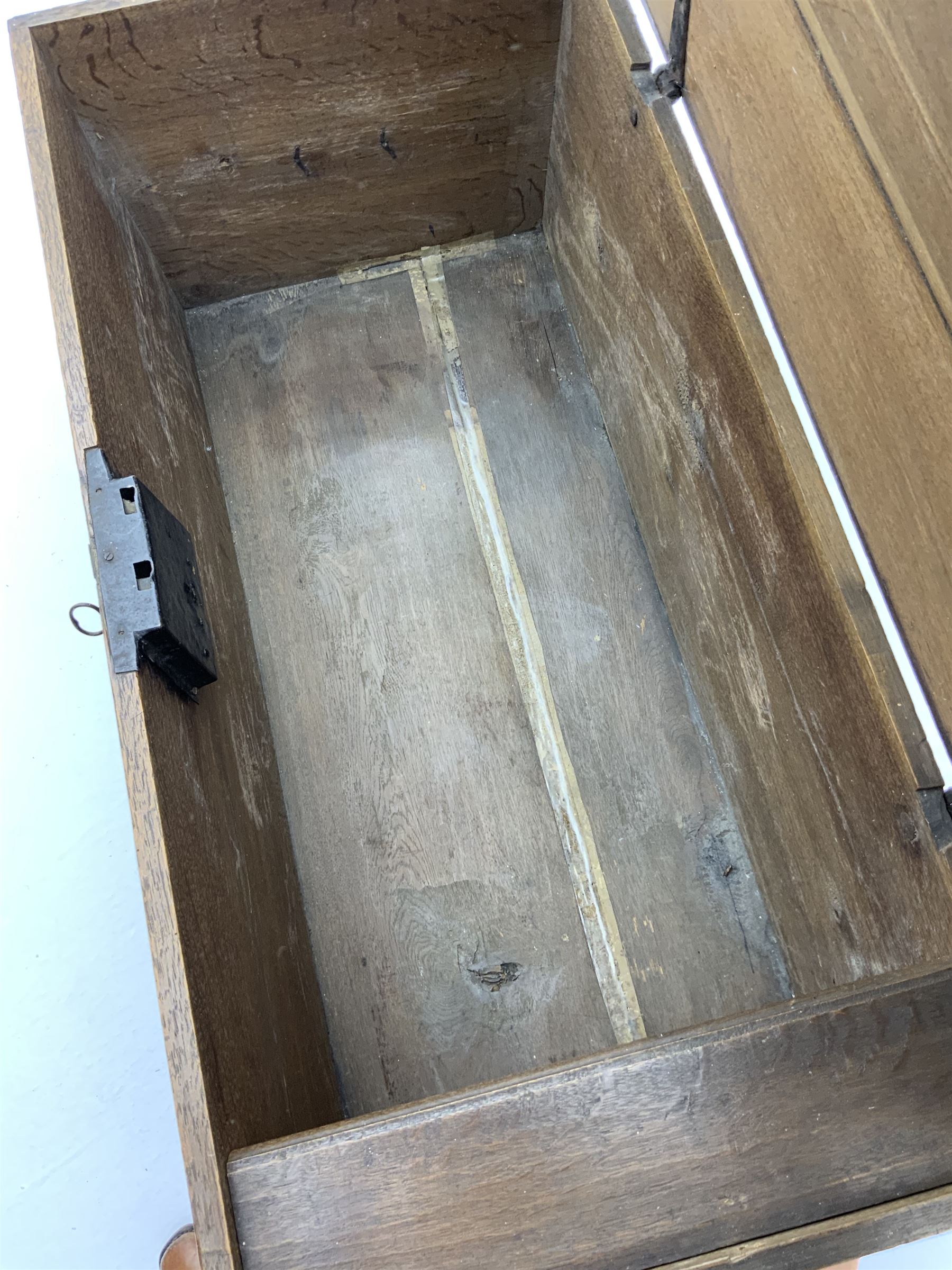 18th century large oak domed trunk, hinge lid enclosing interior, fitted with cast iron handles and joints 